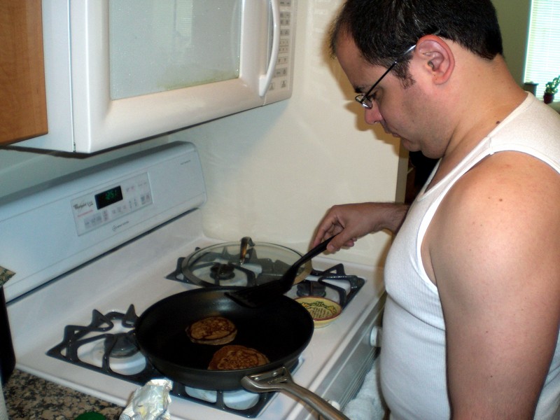 Ian cooking some original pancakes